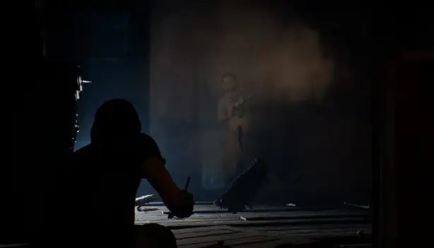 Game character hiding from leather face crouched in a dark room in he Texas Chainsaw Massacre Game